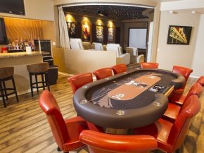 The basement poker table, club and theater location in the